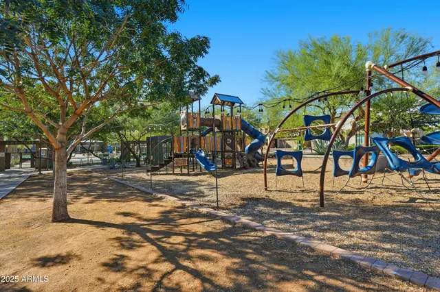 a view of an house with backyard porch and furniture