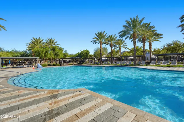 a view of a swimming pool with a sitting space