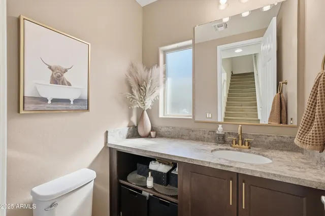 a kitchen with refrigerator cabinets dining table and chairs