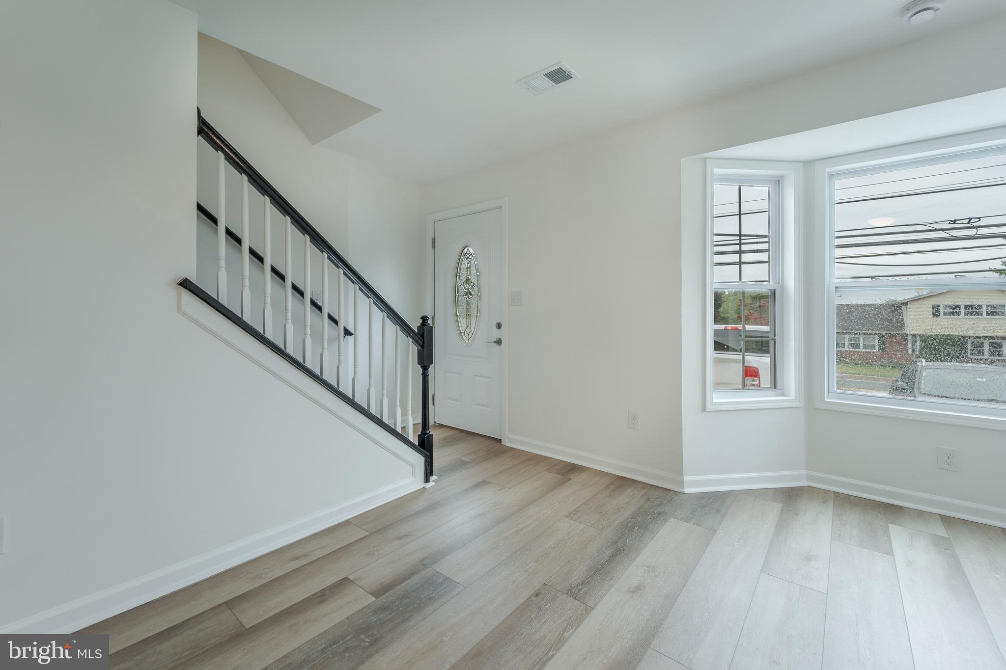 807 Washington Road Westminster, MD 21157 - Photo 2 of 32 a view of an entryway with wooden floor