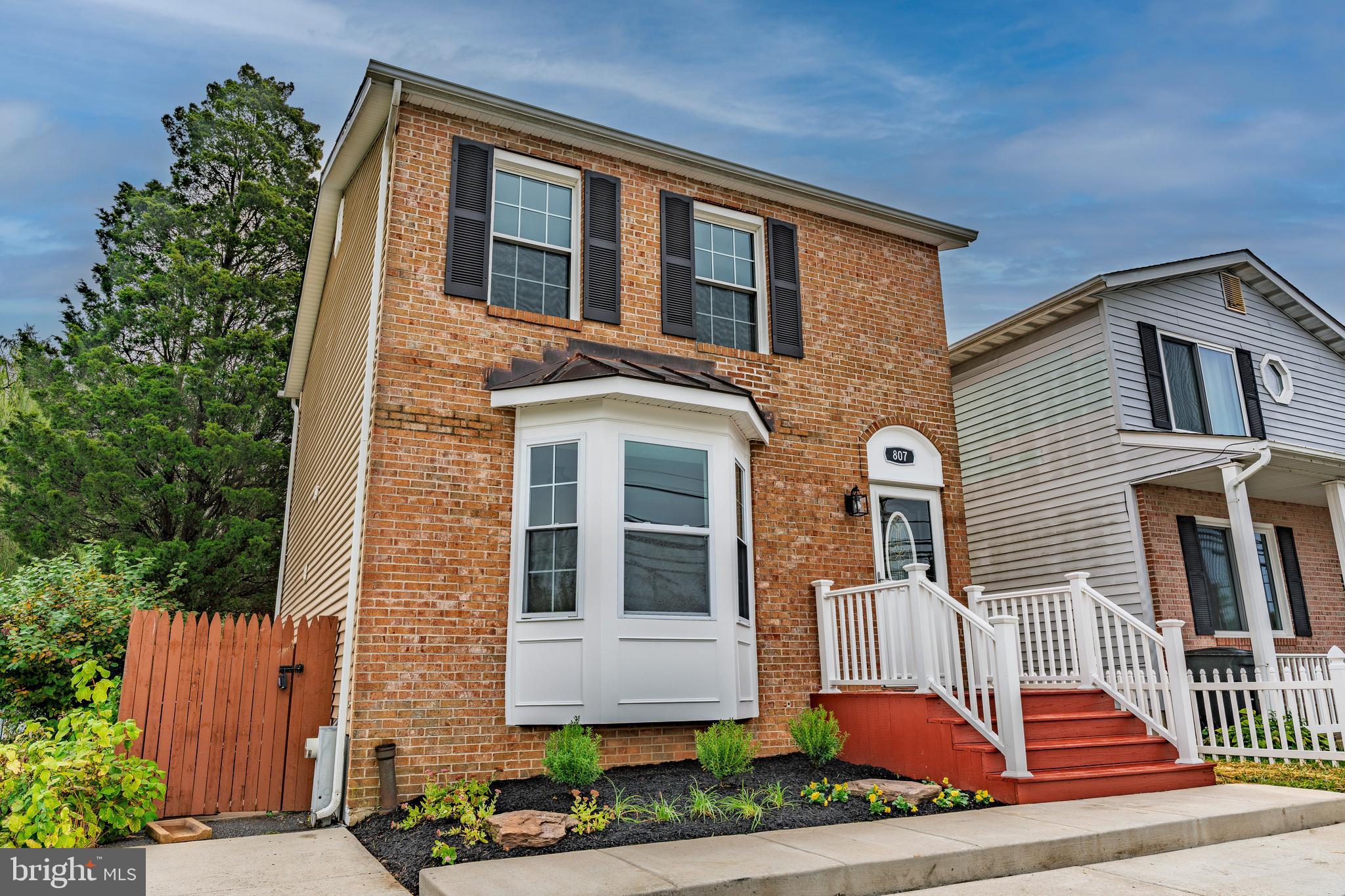 807 Washington Road Westminster, MD 21157 - Photo 24 of 32 a front view of a house with a yard
