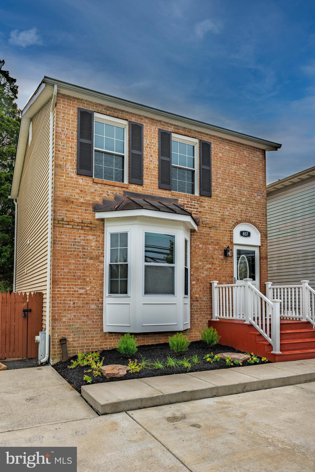 807 Washington Road Westminster, MD 21157 - Photo 25 of 32 a front view of a house with a garden