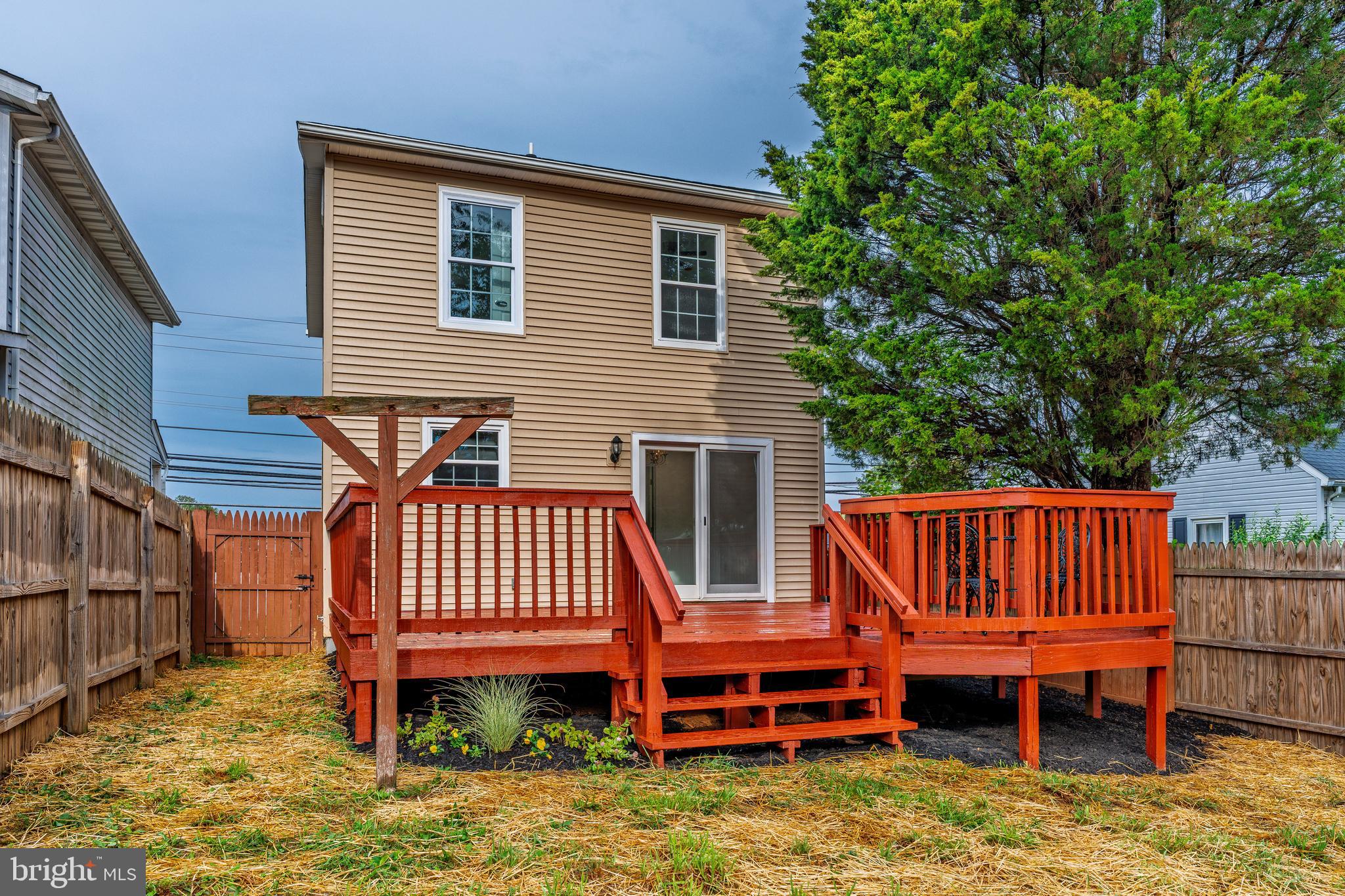 807 Washington Road Westminster, MD 21157 - Photo 26 of 32 a view of a chairs and table on the deck