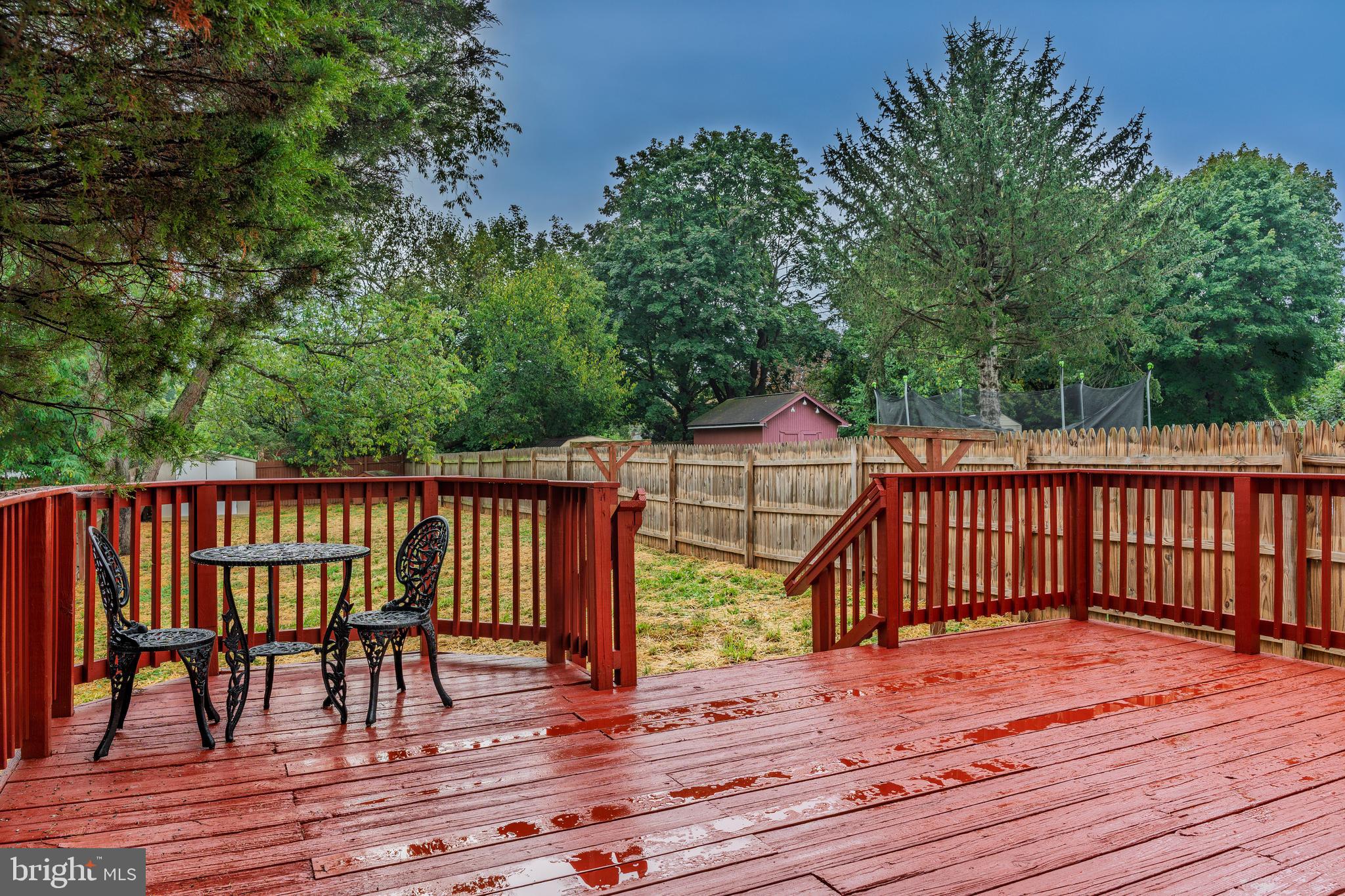 807 Washington Road Westminster, MD 21157 - Photo 30 of 32 a view of balcony with wooden floor and outdoor seating