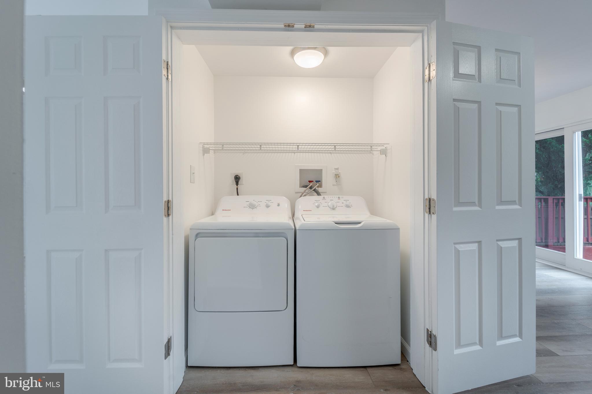 807 Washington Road Westminster, MD 21157 - Photo 6 of 32 a utility room with cabinets washer and dryer