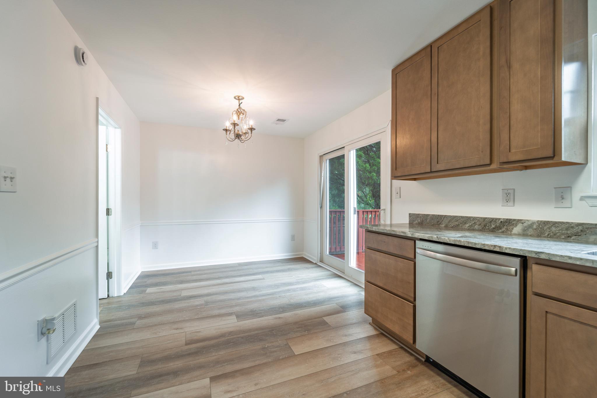 807 Washington Road Westminster, MD 21157 - Photo 10 of 32 a view of a kitchen cabinets and wooden floor