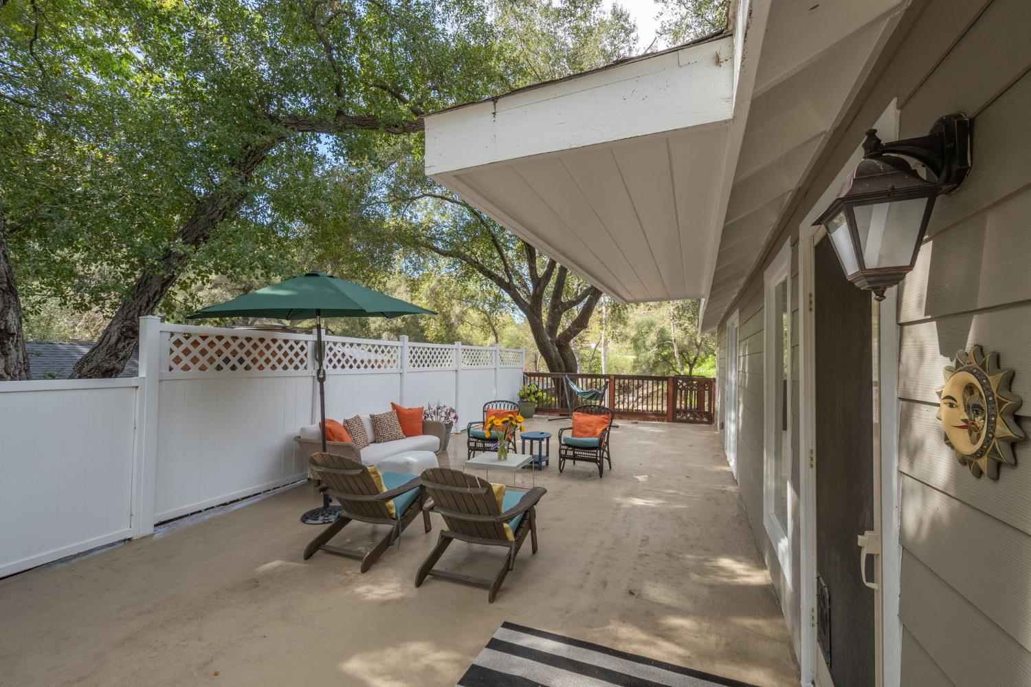 15663 Ojai Road Santa Paula, CA 93060 - Photo 17 of 47 a backyard of a house with table and chairs