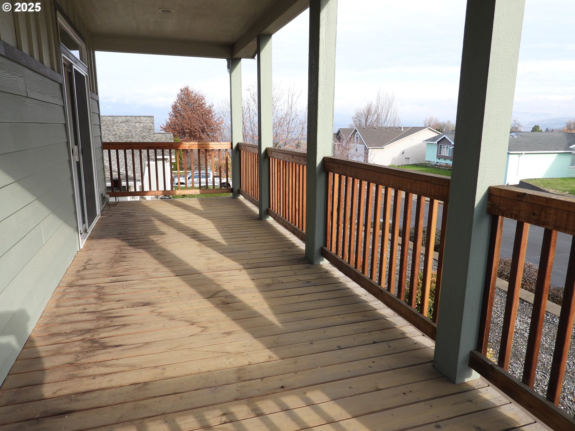 1903 Golden Way The Dalles, OR 97058 - Photo 12 of 22 a view of a balcony with wooden floor