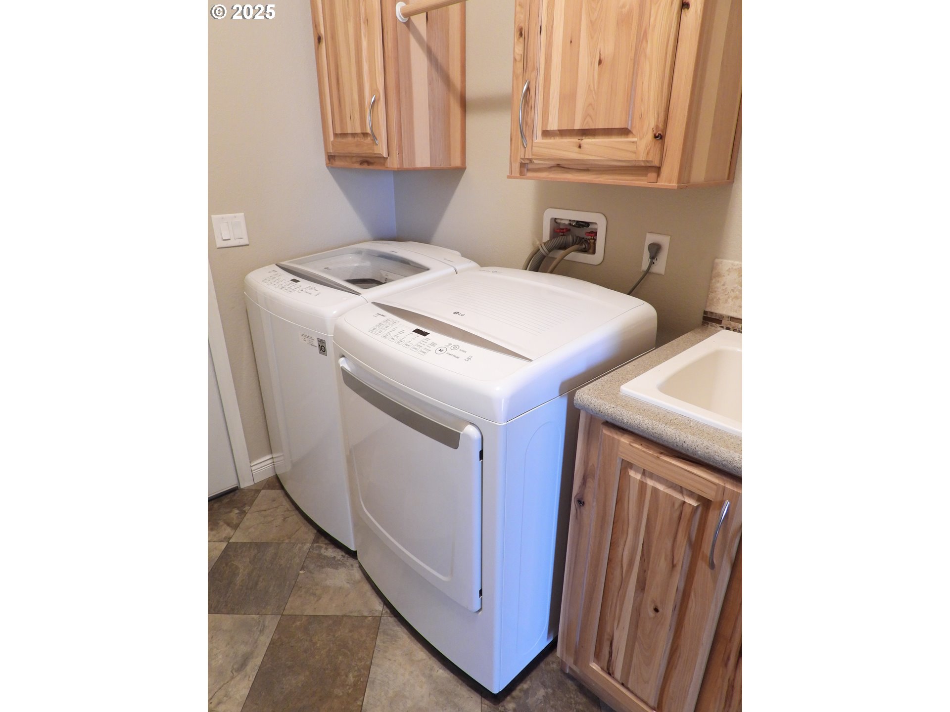 1903 Golden Way The Dalles, OR 97058 - Photo 19 of 22 a utility room with dryer and washer