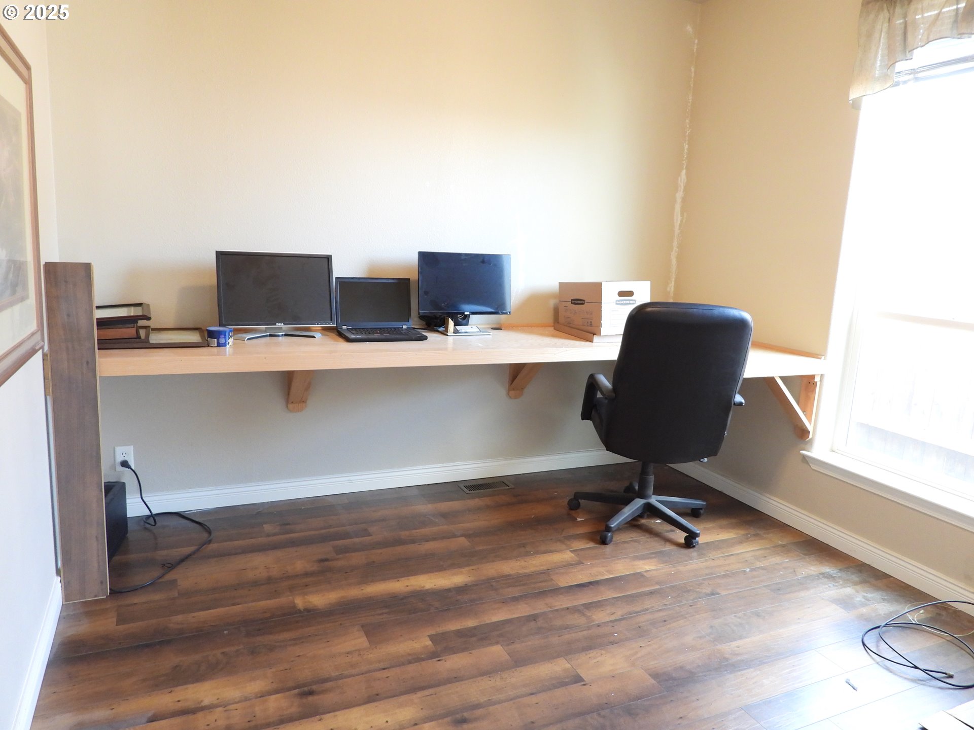 1903 Golden Way The Dalles, OR 97058 - Photo 22 of 22 a view of a workspace with furniture and a window