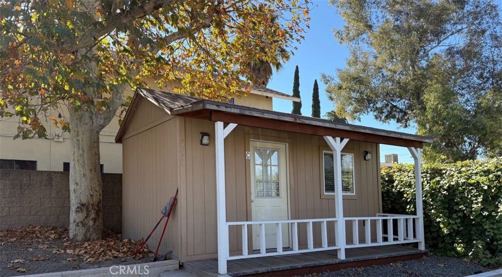 852 North Lugo Avenue, Unit C San Bernardino, CA 92410 - Photo 2 of 8 a view of a house with a small yard