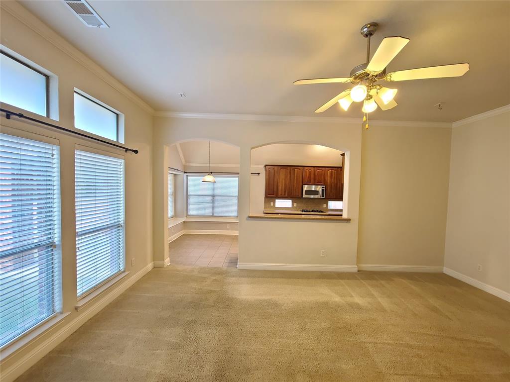 9729 Stripling Drive Fort Worth, TX 76244 - Photo 11 of 40 a view of a hallway with a chandelier