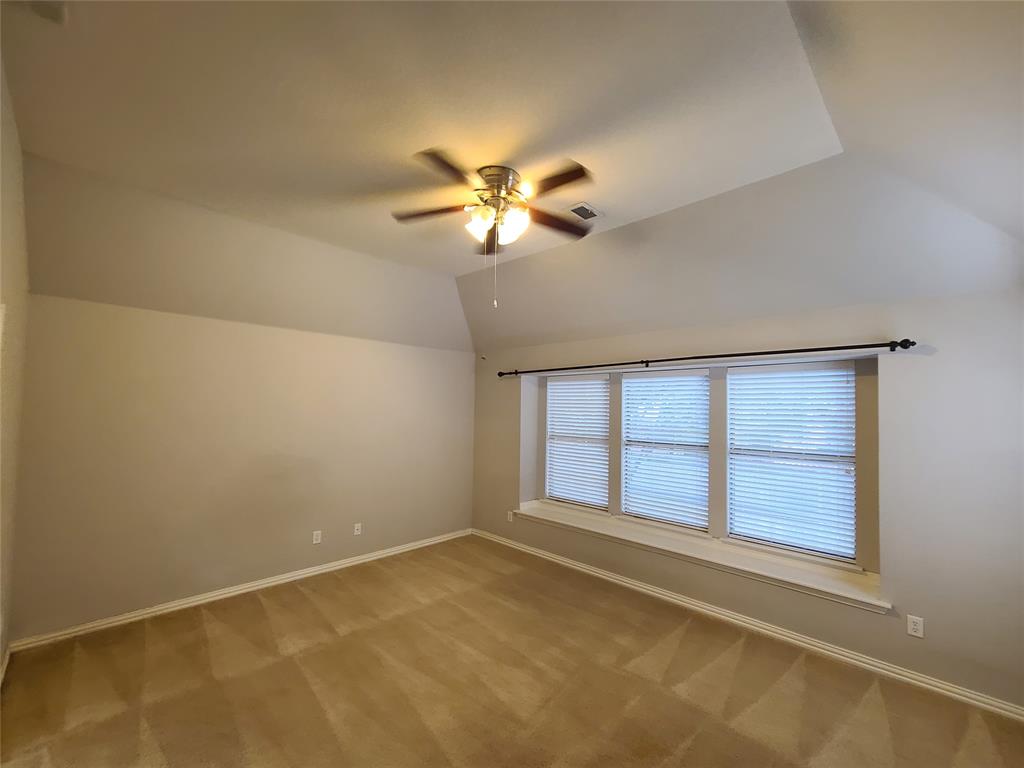 9729 Stripling Drive Fort Worth, TX 76244 - Photo 23 of 40 a view of an empty room with a window