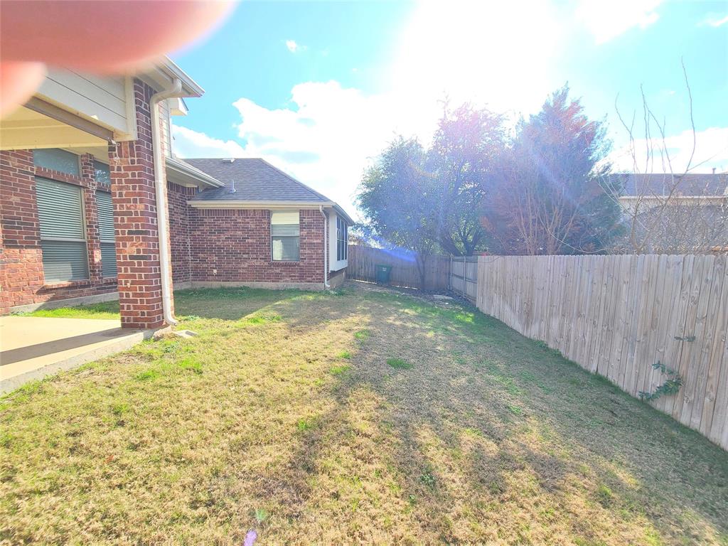 9729 Stripling Drive Fort Worth, TX 76244 - Photo 37 of 40 a view of a house with a yard