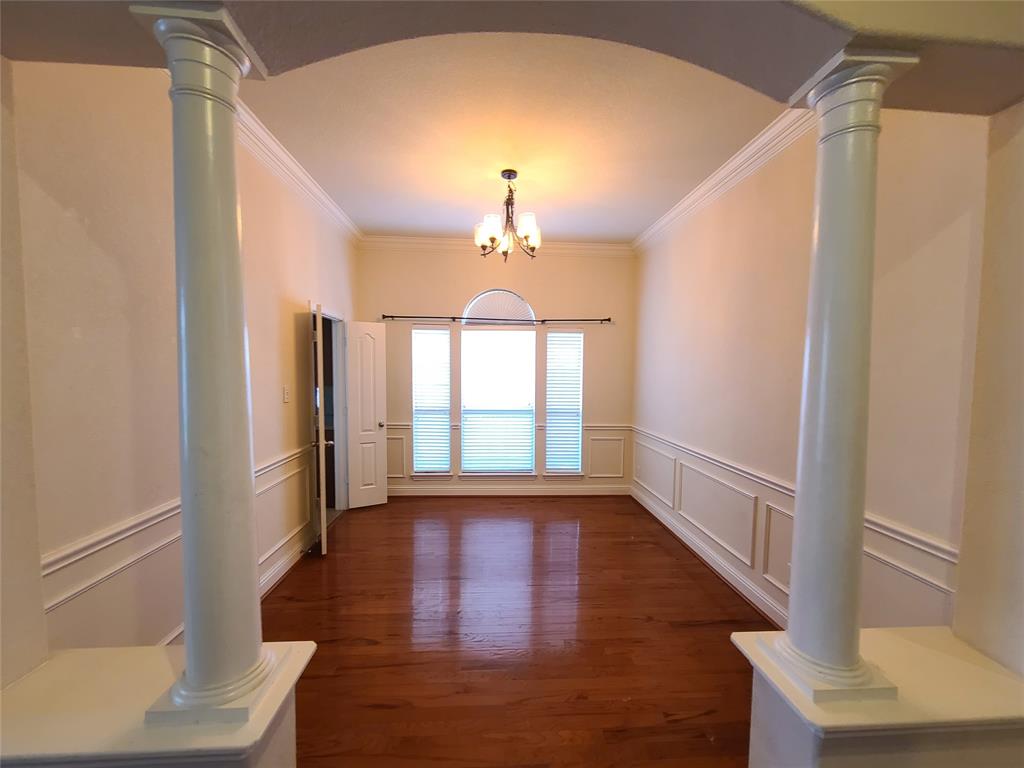 9729 Stripling Drive Fort Worth, TX 76244 - Photo 4 of 40 a view of entryway and hall with wooden floor