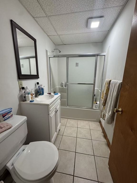 65-65A Beach Street Boston, MA 02111 - Photo 13 of 13 a bathroom with a toilet a sink a vanity and mirror