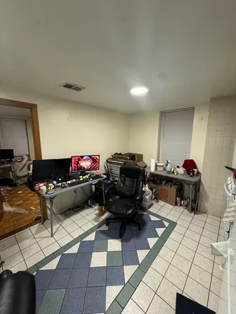 a kitchen with a sink a stove and a refrigerator