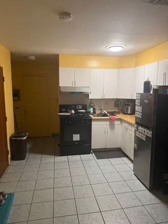 a bathroom with a sink and a shower