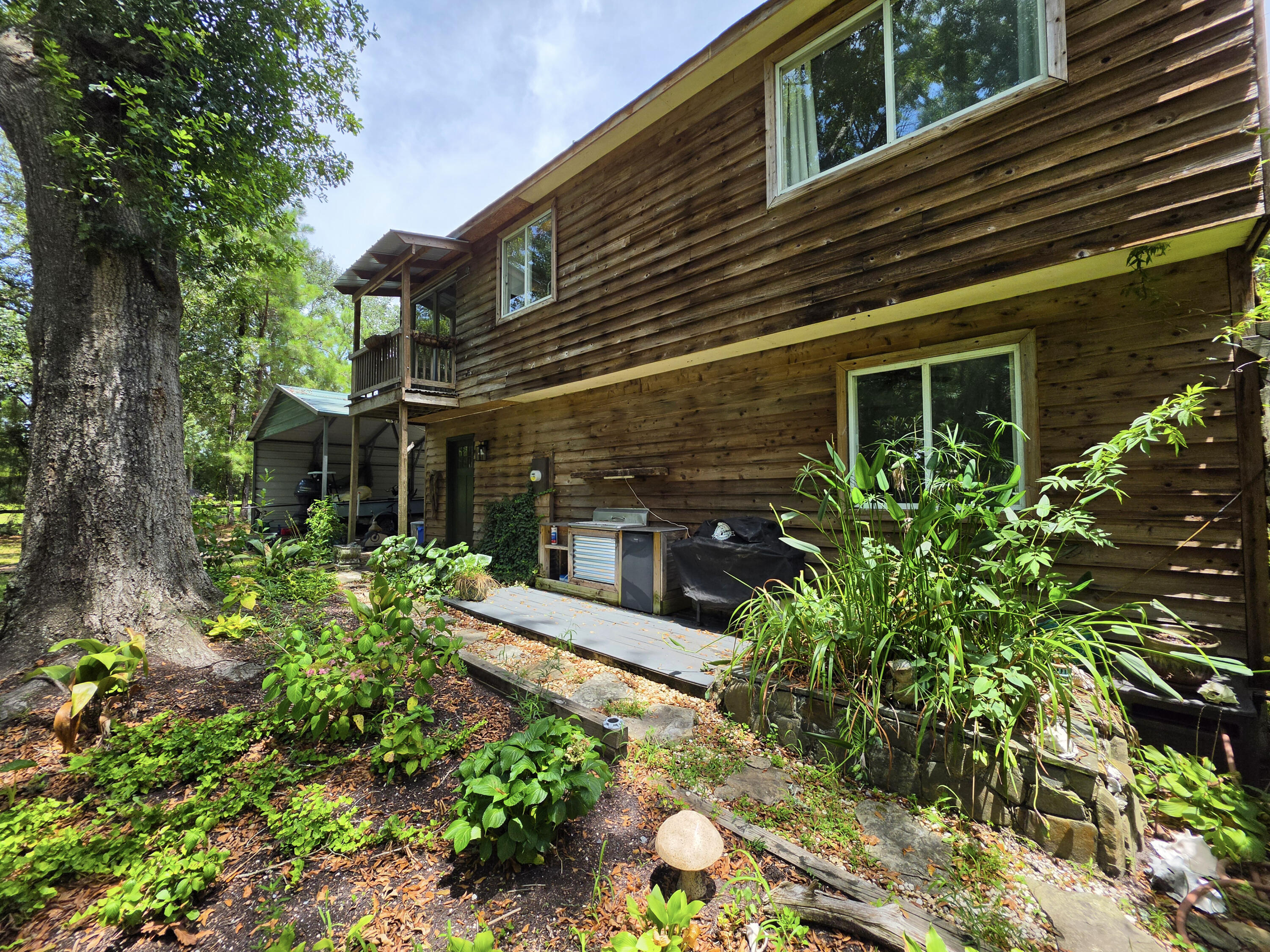 6374 Maxville Road Awendaw, SC 29429 - Photo 21 of 25 22-back-deck-left-home-for-rent-in-awend