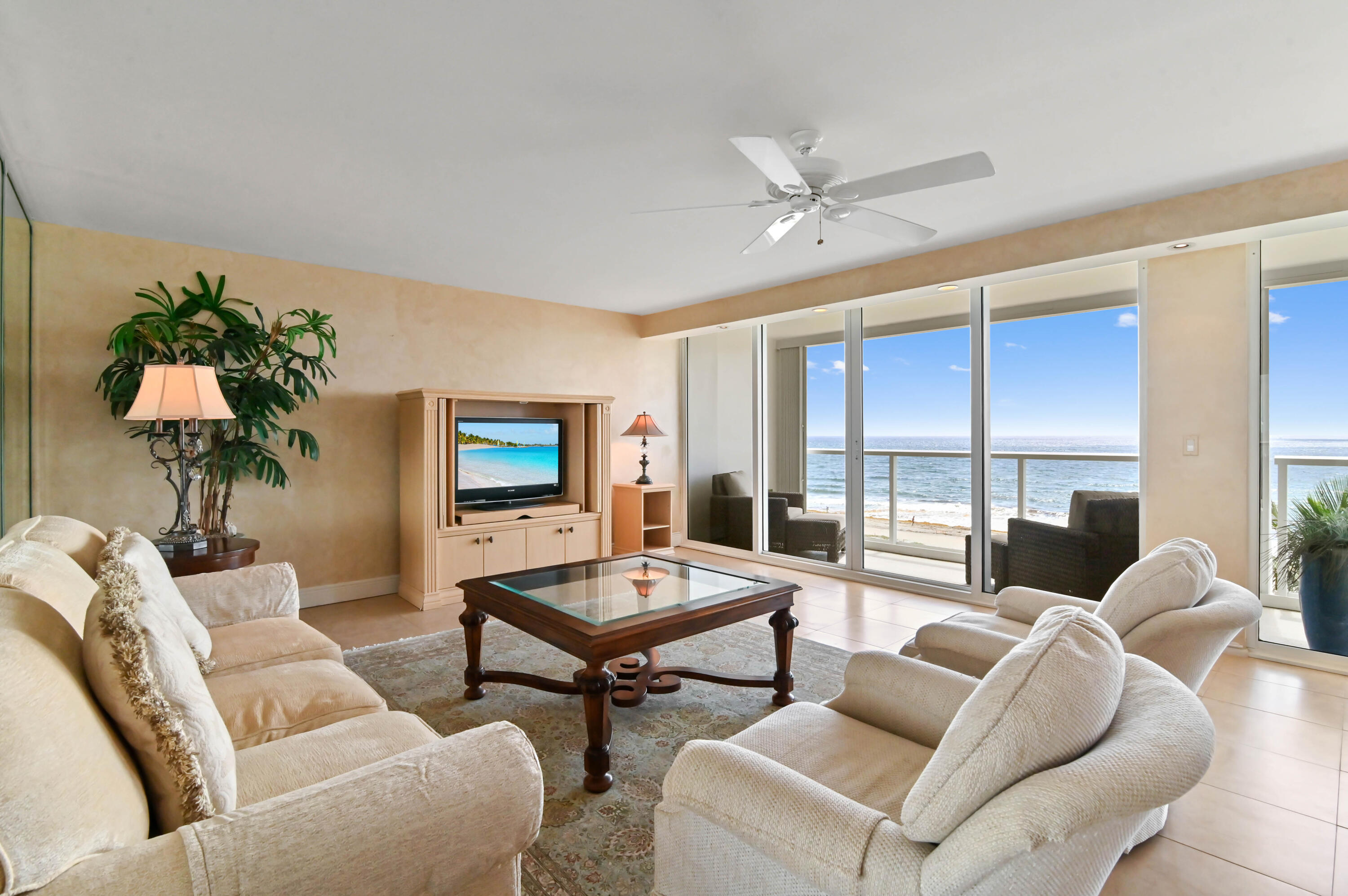 2800 South Ocean Boulevard, Unit 5J Boca Raton, FL 33432 - Photo 5 of 56 a living room with furniture and a large window