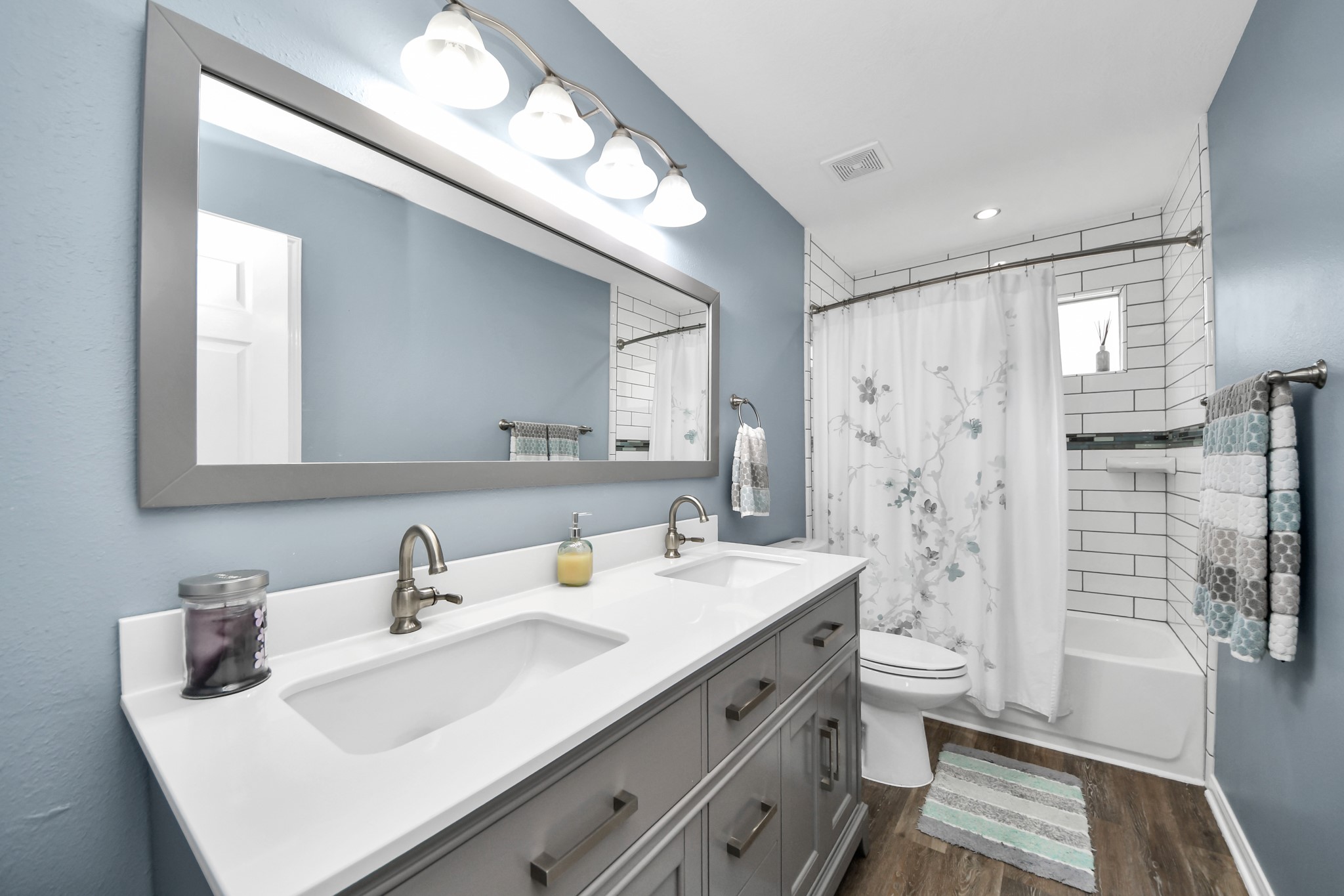 7622 McCormick Mill Court Houston, TX 77095 - Photo 27 of 37 a bathroom with a double vanity sink mirror and shower