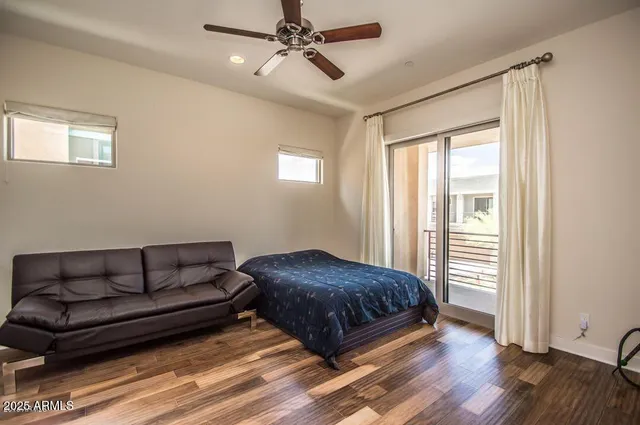 a view of a swimming pool and a back yard