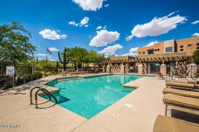a view of a lobby with furniture and a floor to ceiling window