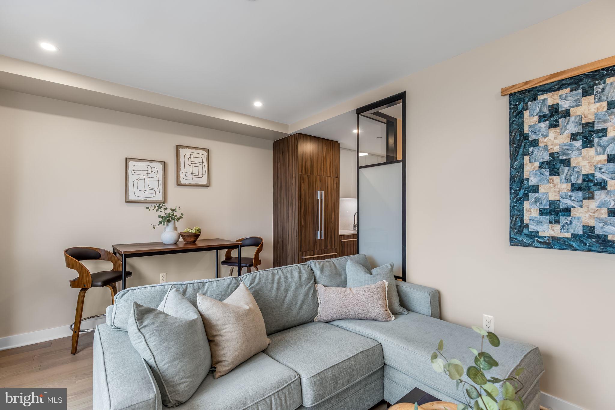 37 L Street Southeast, Unit 803 Washington, DC 20003 - Photo 17 of 46 Sunny living/dining area w floor to ceiling window