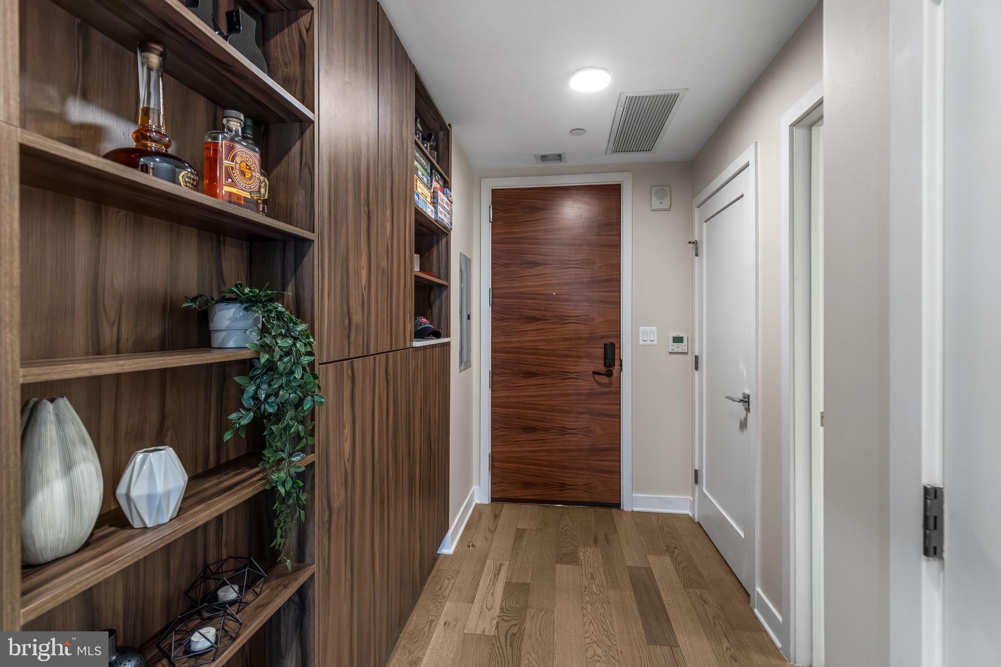 37 L Street Southeast, Unit 803 Washington, DC 20003 - Photo 5 of 46 Sunny entry with fab built-ins