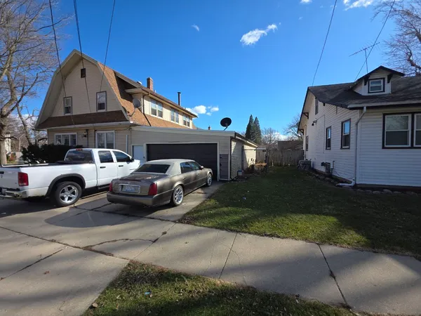 a car parked in front of a house