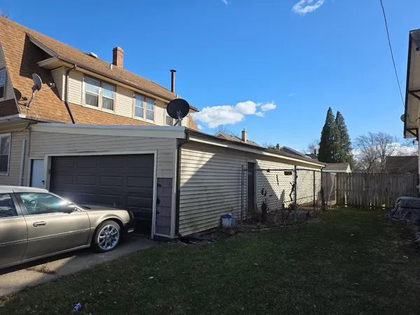 a car parked in front of a house