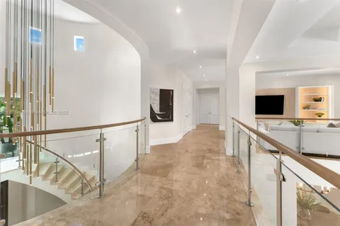 a living room with furniture and a gate