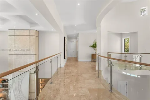 a bedroom with a bed and a potted plant