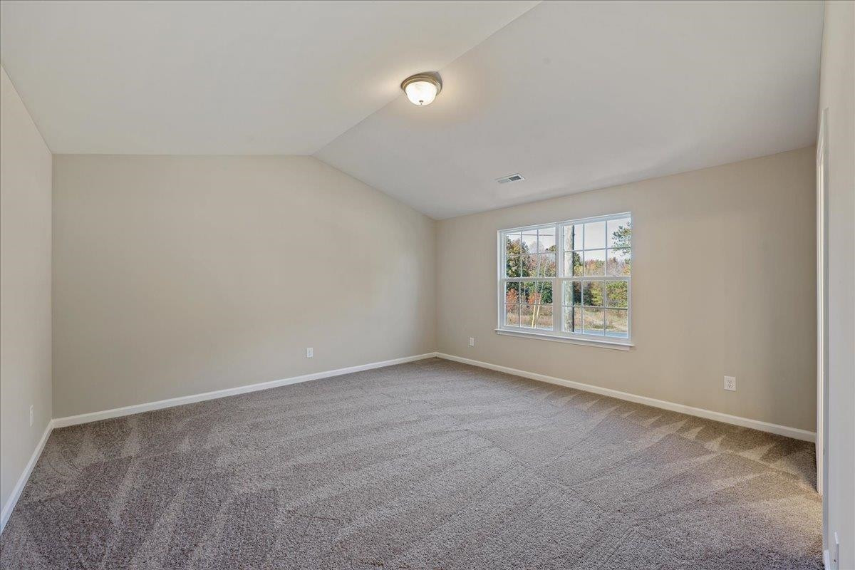 2178 Campbell Loop Burlington, NC 27215 - Photo 13 of 30 an empty room with windows