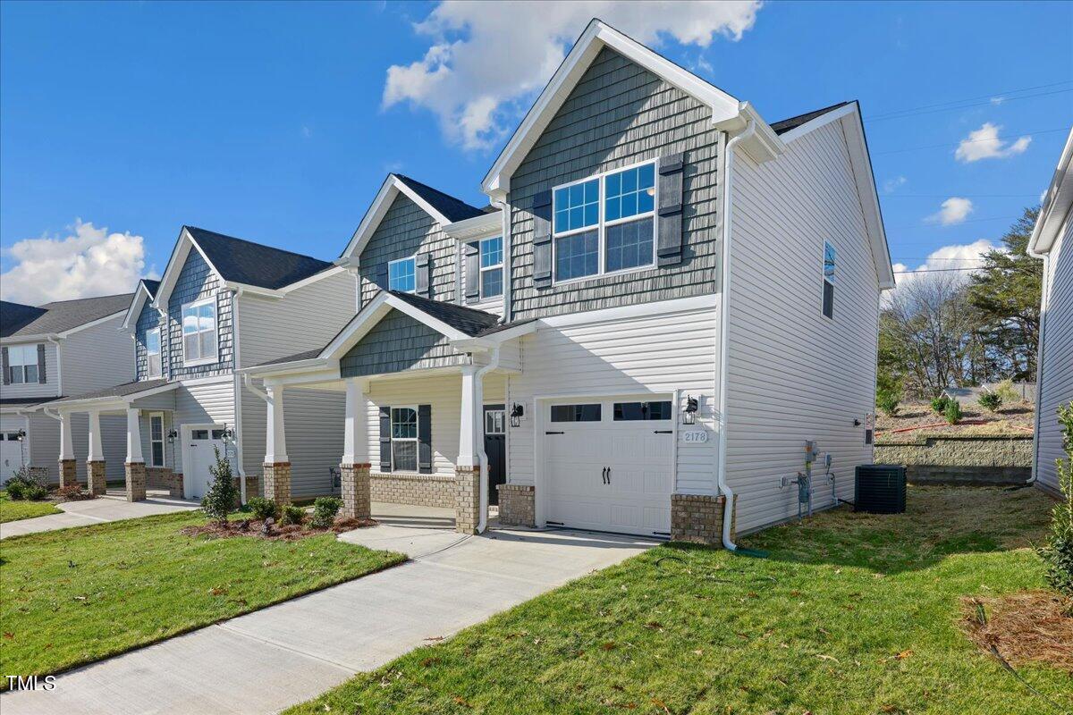 2178 Campbell Loop Burlington, NC 27215 - Photo 2 of 30 a view of a yard in front of house