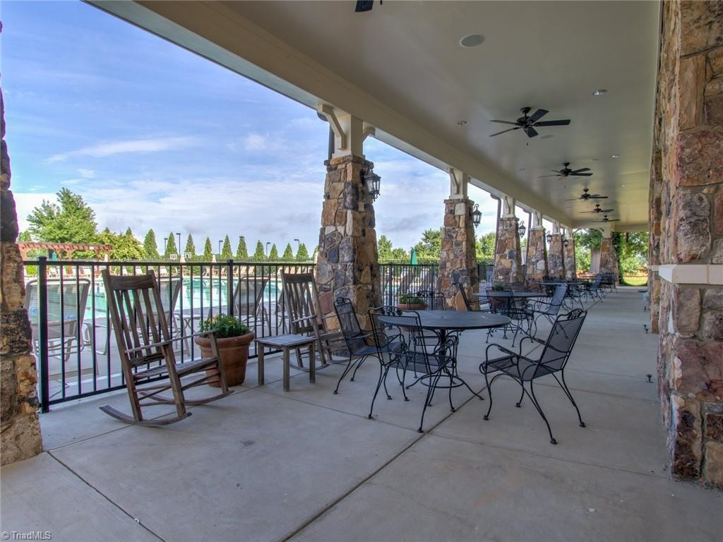 2178 Campbell Loop Burlington, NC 27215 - Photo 23 of 30 a view of a patio with a table and chairs
