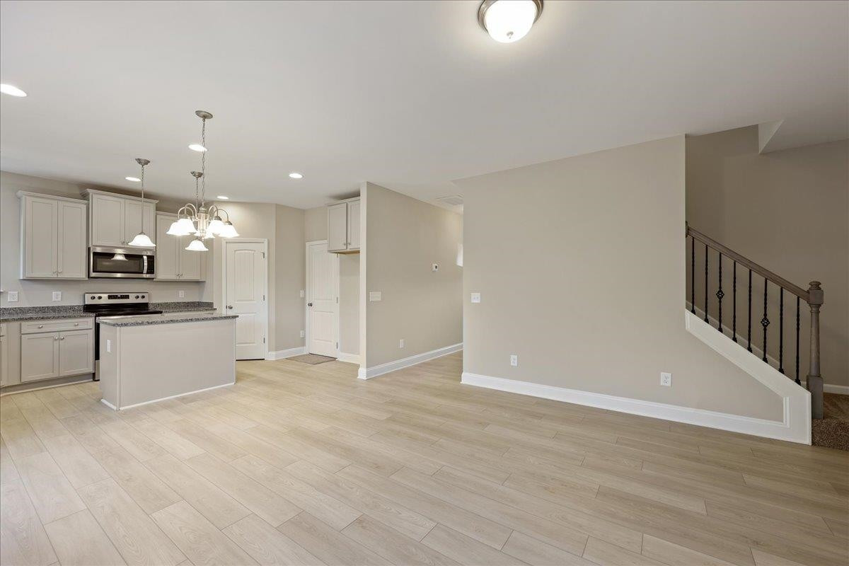 2178 Campbell Loop Burlington, NC 27215 - Photo 7 of 30 a view of kitchen with refrigerator sink and cabinets