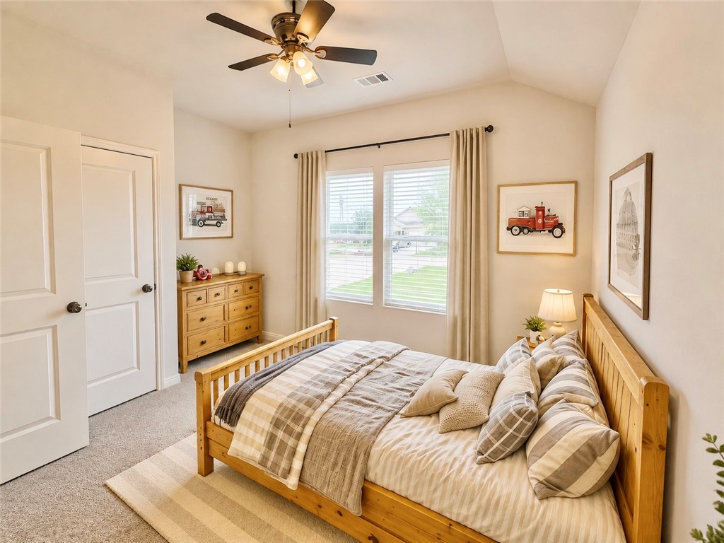 137 Windmill Road Somerville, TX 77879 - Photo 11 of 17 a bedroom with a bed and a window