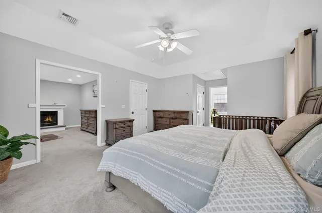 a bathroom with a sink toilet and a mirror