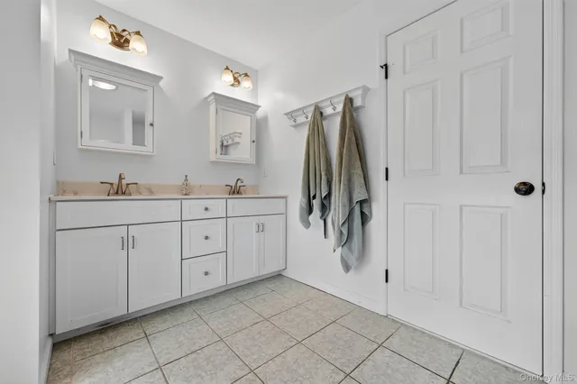 a bath room with a bath tub and a shower