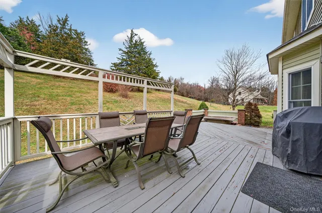 a house view with outdoor seating space