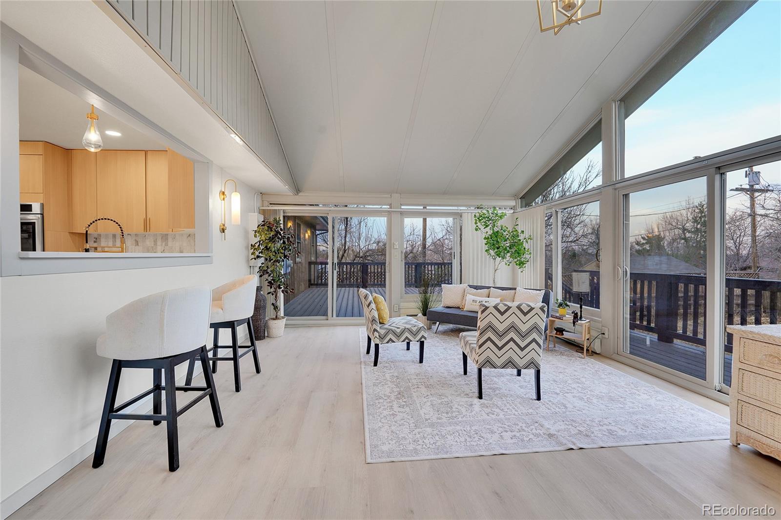 830 Welch Street Golden, CO 80401 - Photo 11 of 37 a living room with furniture and a large window