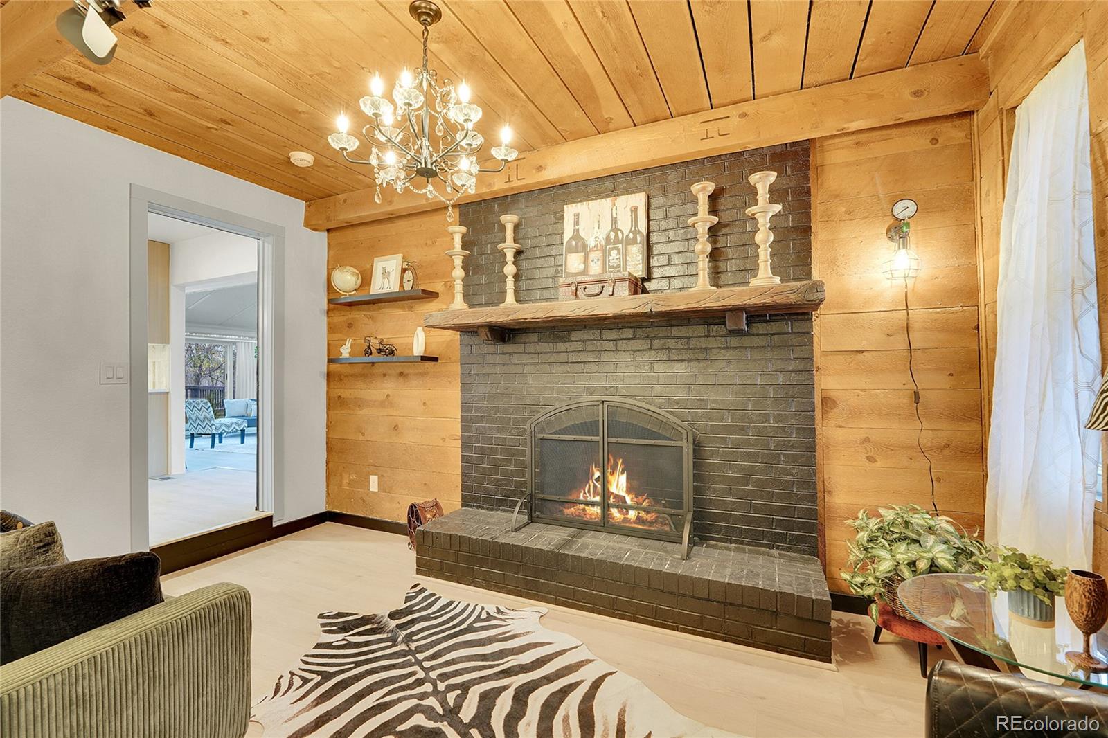 830 Welch Street Golden, CO 80401 - Photo 13 of 37 a living room with furniture and a fireplace