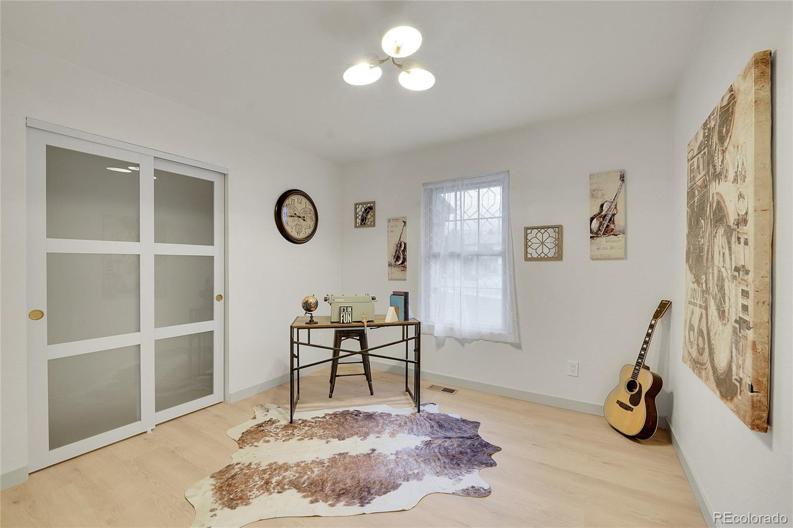 830 Welch Street Golden, CO 80401 - Photo 16 of 37 a view of a livingroom with furniture and a window