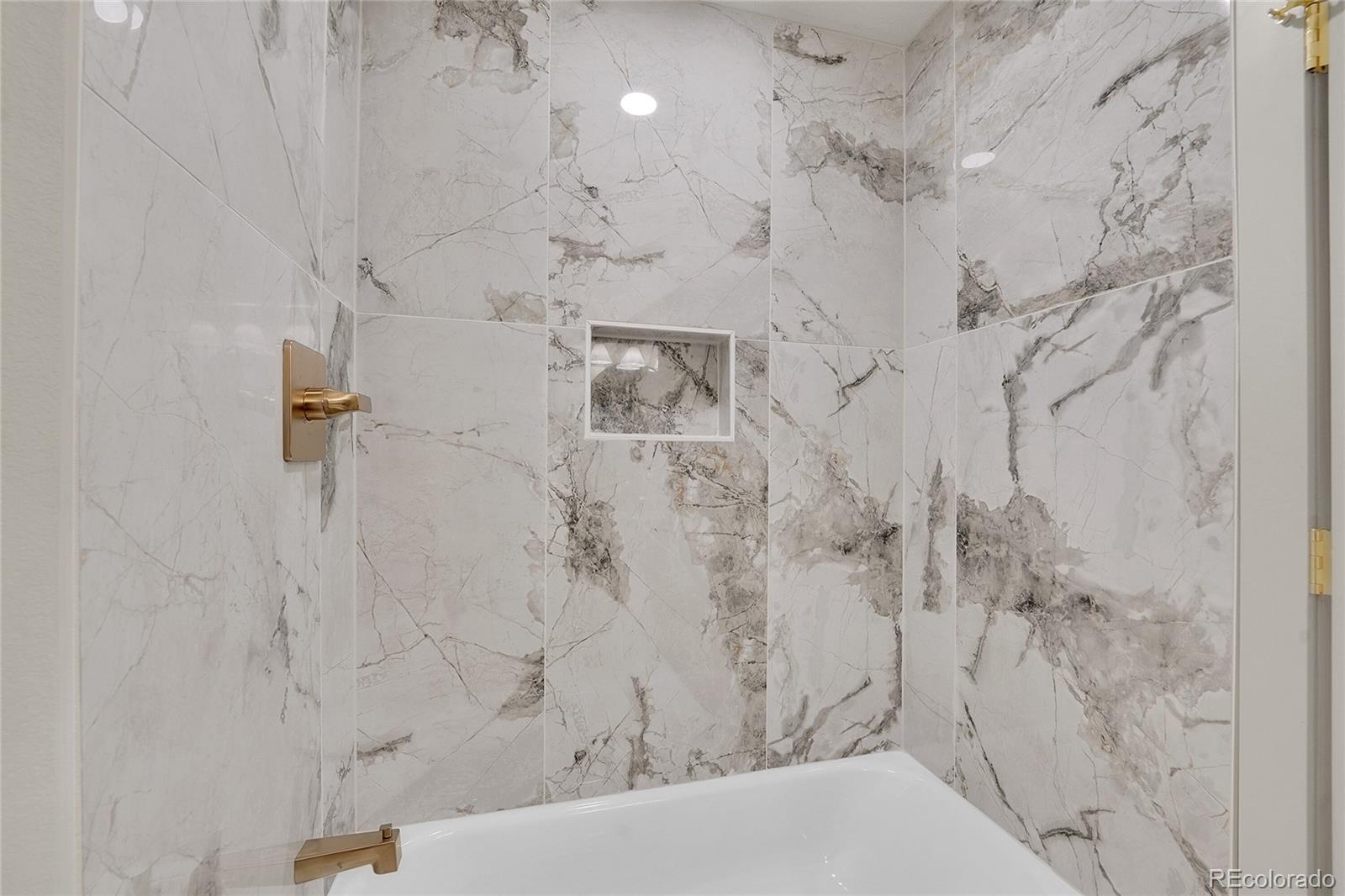 830 Welch Street Golden, CO 80401 - Photo 22 of 37 a bathroom with a shower
