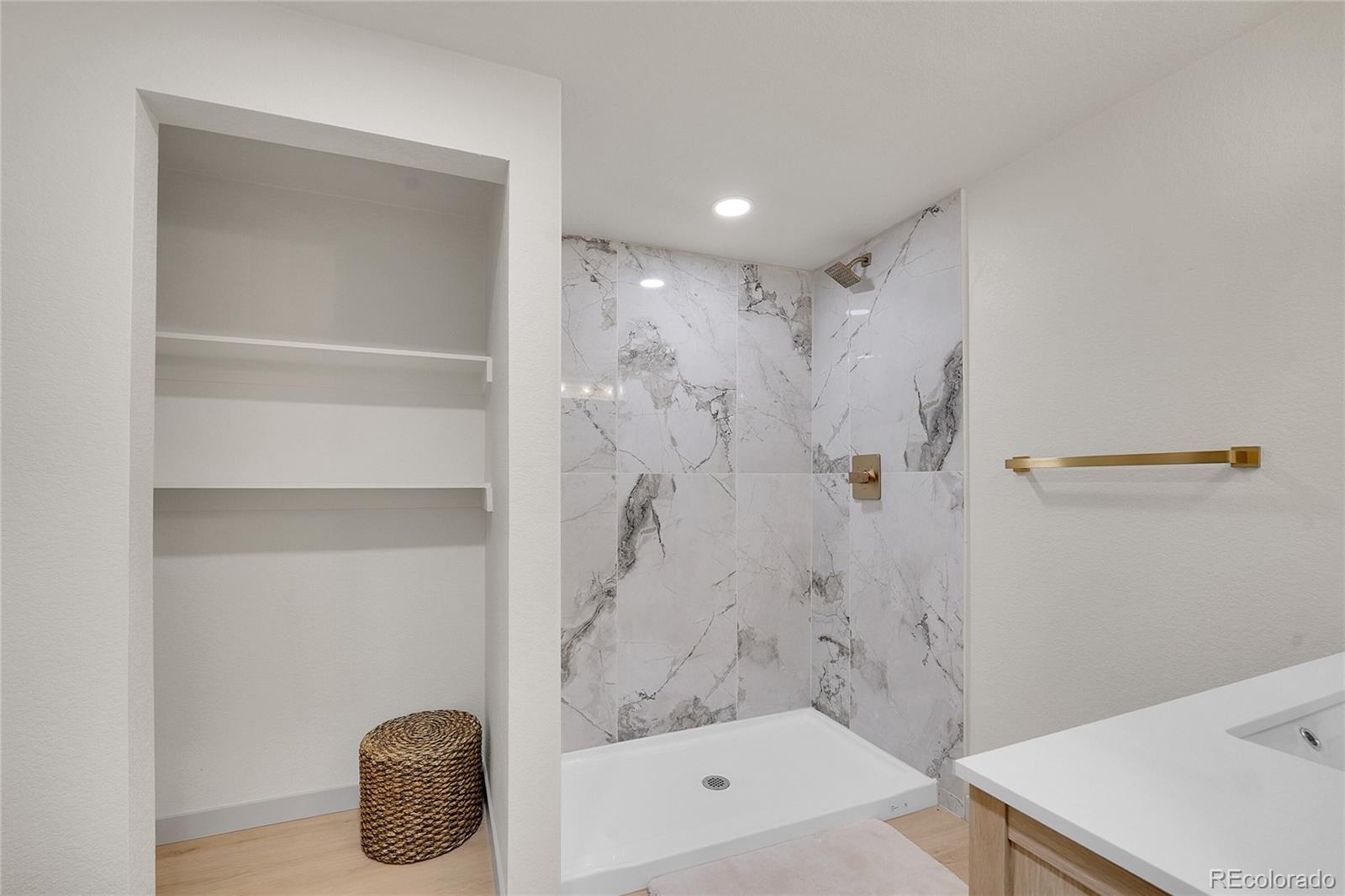 830 Welch Street Golden, CO 80401 - Photo 30 of 37 a bathroom with a shower and a toilet