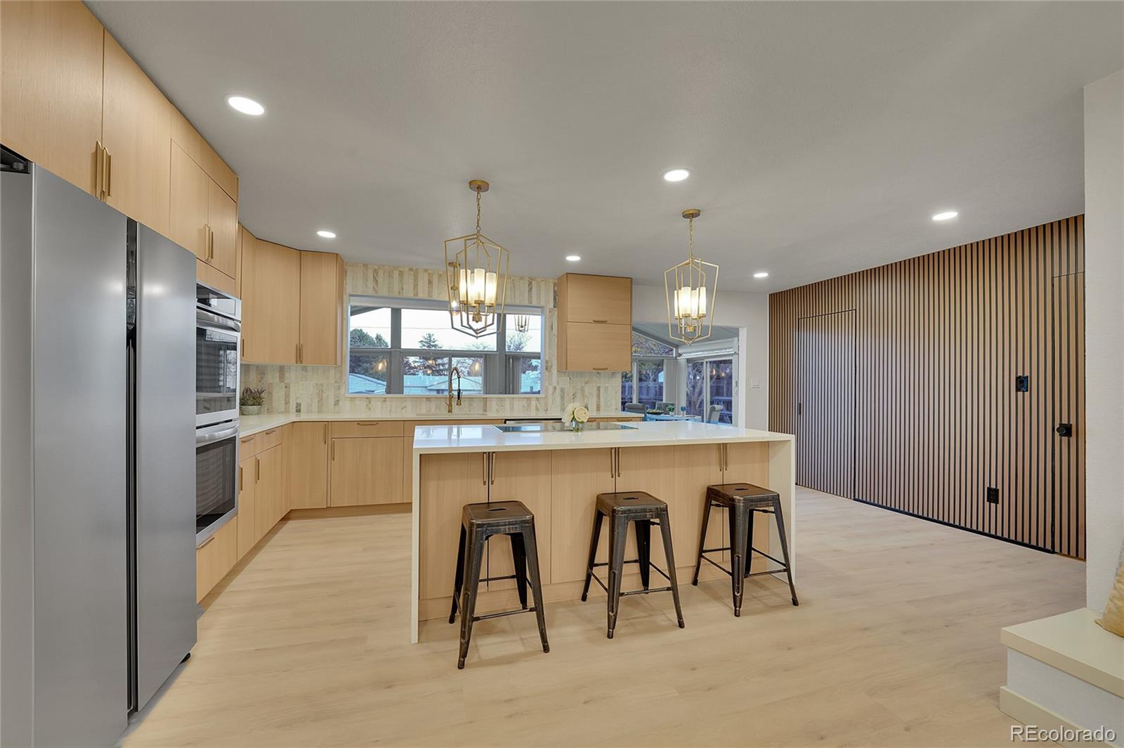 830 Welch Street Golden, CO 80401 - Photo 4 of 37 a large kitchen with a table and chairs