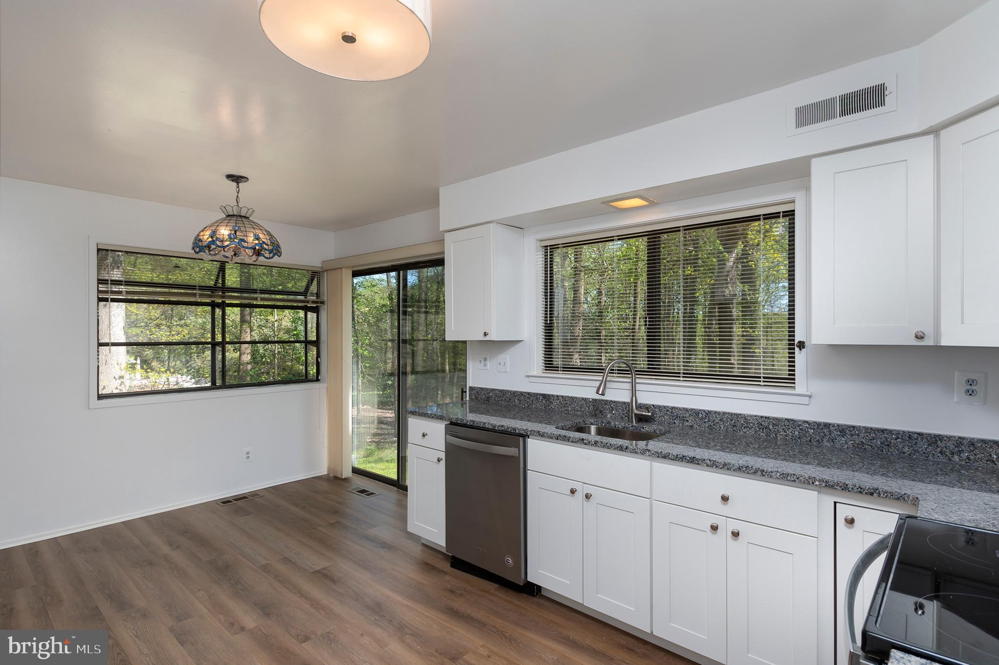 4541 Dustin Road Burtonsville, MD 20866 - Photo 12 of 34 Table space with sliding door to rear yard
