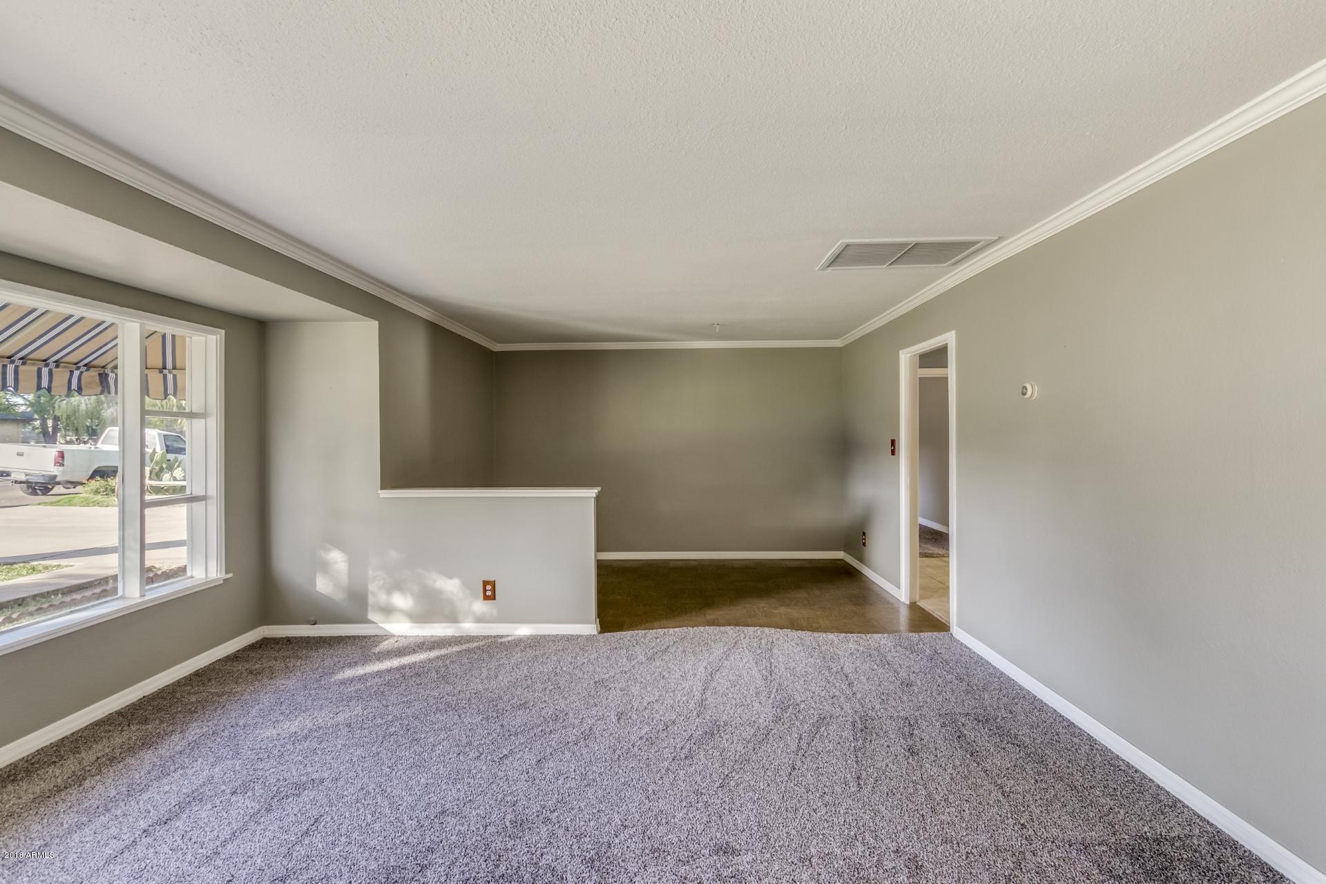 2808 West Rovey Avenue Phoenix, AZ 85017 - Photo 5 of 30 Living Room and Dining Area