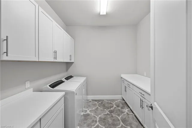 a storage room with a washer and dryer